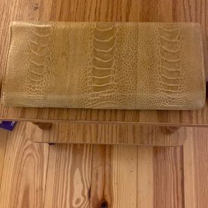 Genuine Ostrich leg clutch in Black…newly refinished